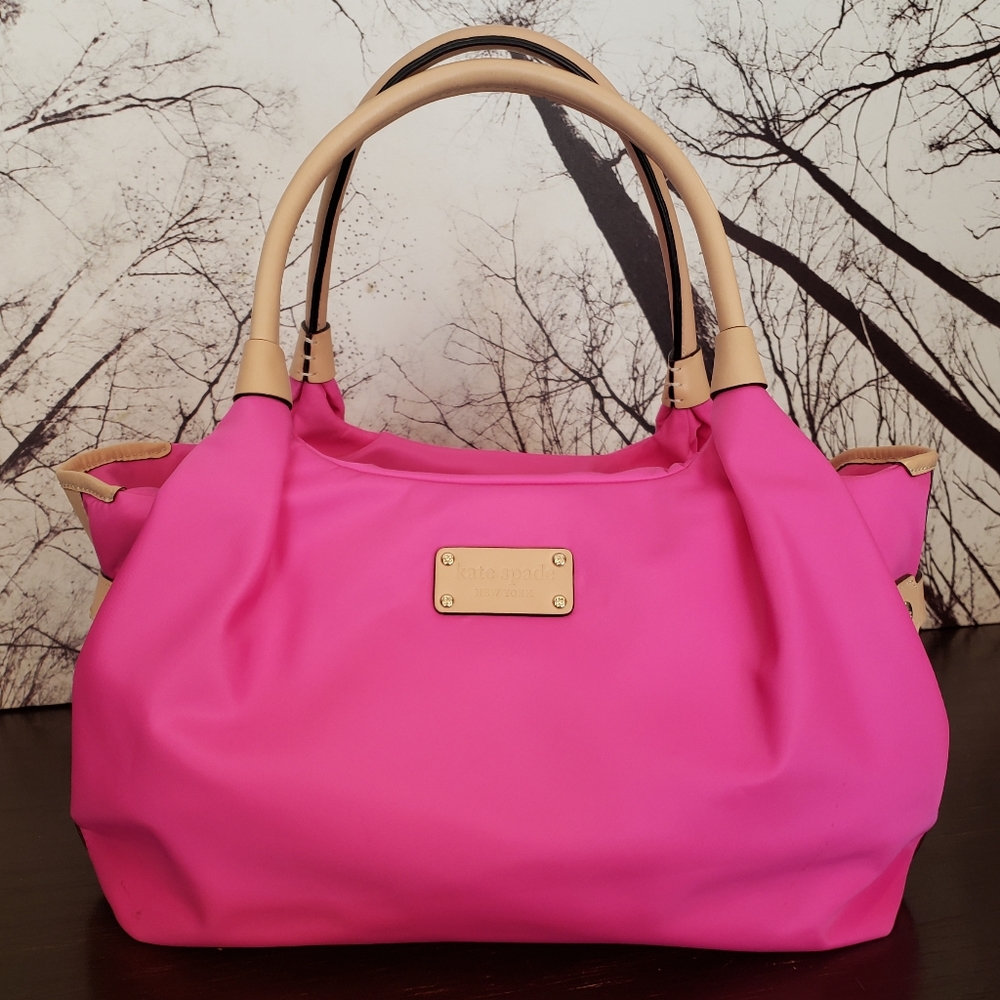 Kate Spade handbag in pink with tan handles